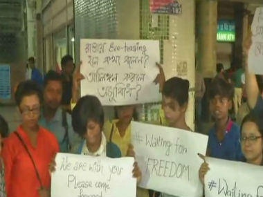 Couple thrashed on Kolkata metro: Protesters rally outside Tollygunge station to demand action, offer 'free hugs' to commuters Couple thrashed on Kolkata metro: Protesters rally outside Tollygunge station to demand action, offer 'free hugs' to commuters