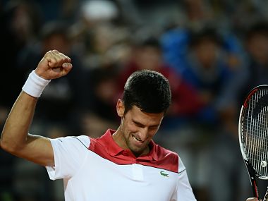 Novak Djokovic celebrates his win over Japan's Kei Nishikori on Friday. AFP
