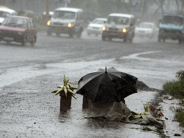 Twin storms along with heavy rains kill ten in West Bengal; road, rail and air traffic disrupted Twin storms along with heavy rains kill ten in West Bengal; road, rail and air traffic disrupted
