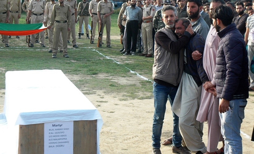 Mohammad Abbas Shah being comforted after the death of his son. Firstpost/Hilal Shah