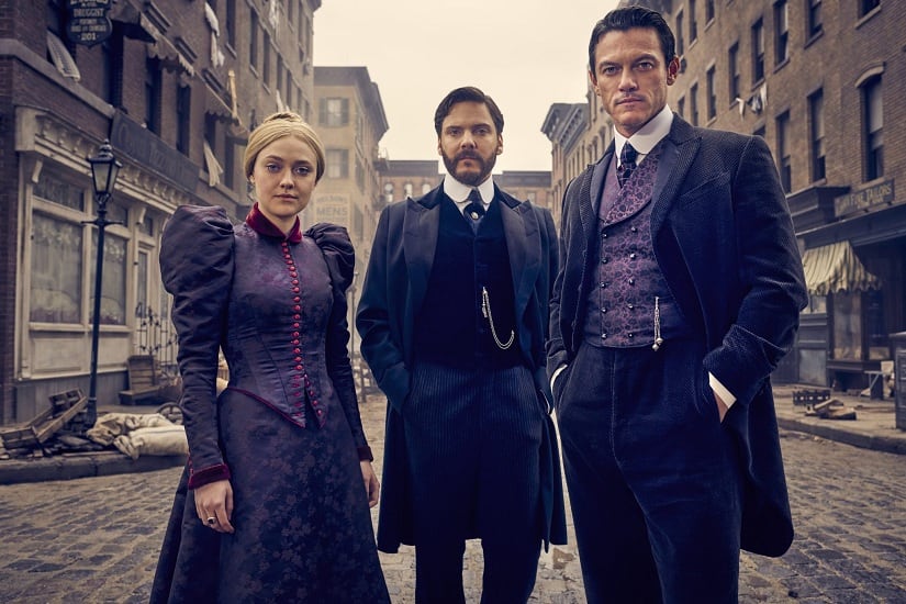 (L-R) Dakota Fanning as Sara Howard, Daniel Brühl as Dr Laszlo Kreizler and Luke Evans as John Moore in The Alienist