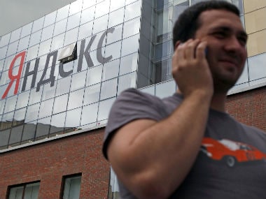 A man speaks on a mobile phone outside the headquarters of Yandex company in Moscow June 14, 2012. Reuters