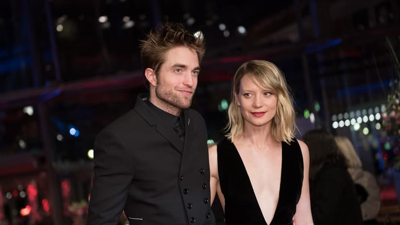 Robert Pattinson and Mia Wasikowska on the red carpet for the premiere of Damsel during the 68th Berlinale film festival on February 16, 2018 in Berlin. AFP/Stefanie Loos