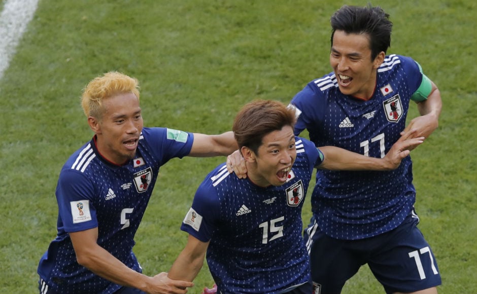 Yuya Osako celebrates with his teammates after scoring Japan's second goal against Colombia. AP Yuya Osako celebrates with his teammates after scoring Japan's second goal against Colombia. AP