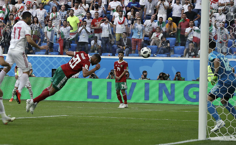 Morocco's Aziz Bouhaddouz scores an own goal, leading to his team's 0-1 loss to Iran. AP Morocco's Aziz Bouhaddouz scores an own goal, leading to his team's 0-1 loss to Iran. AP