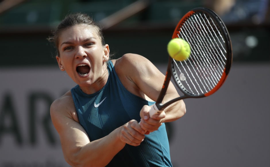 Romania's Simona Halep returns the ball to Taylor Townsend, of the U.S, during their second round match. AP Romania's Simona Halep returns the ball to Taylor Townsend, of the U.S, during their second round match. AP