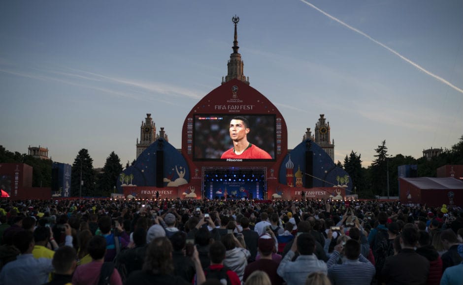 Fans watch Cristiano Ronaldo prepare for a free-kick in the second half of the Portugal-Spain battle. AP Fans watch Cristiano Ronaldo prepare for a free-kick in the second half of the Portugal-Spain battle. AP