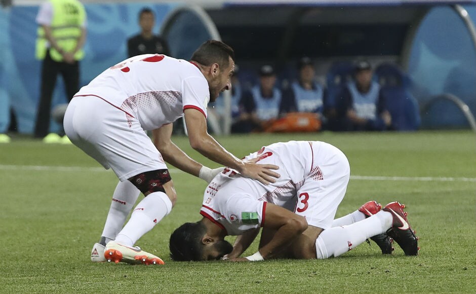 Tunisia's Ferjani Sassi celebrates after scoring the equaliser against England. AP Tunisia's Ferjani Sassi celebrates after scoring the equaliser against England. AP
