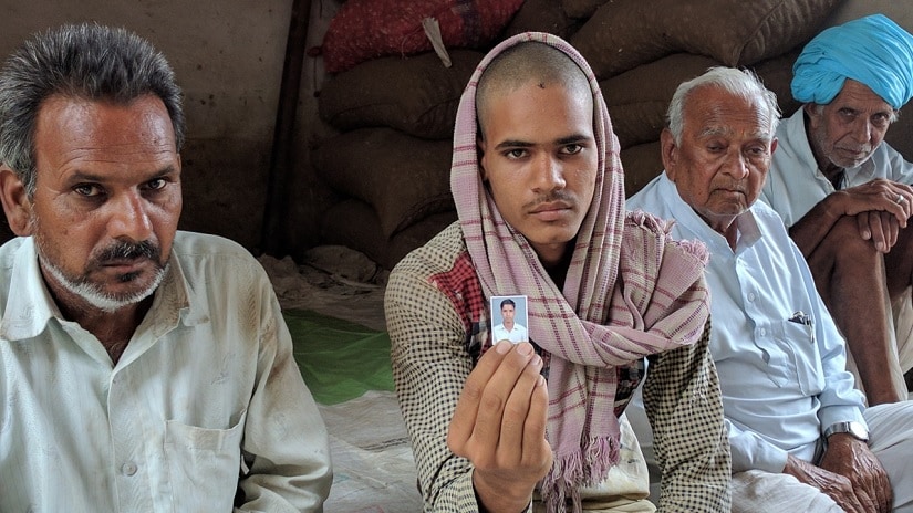 A family mourns the loss of their 23-year-old, who died in Mandsaur. Firstpost/Debobrat Ghose