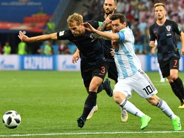 Croatia's defender Ivan Strinic (L) vies with Argentina's Lionel Messi on Thursday. AFP