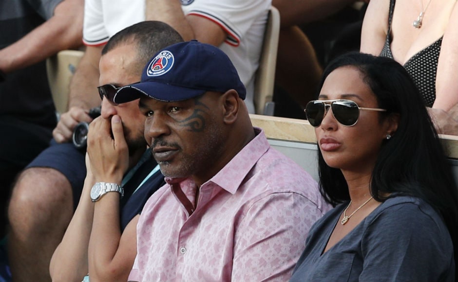 Boxing great Mike Tyson watches Serena William's match from the stands in Paris. AP Boxing great Mike Tyson watches Serena William's match from the stands in Paris. AP