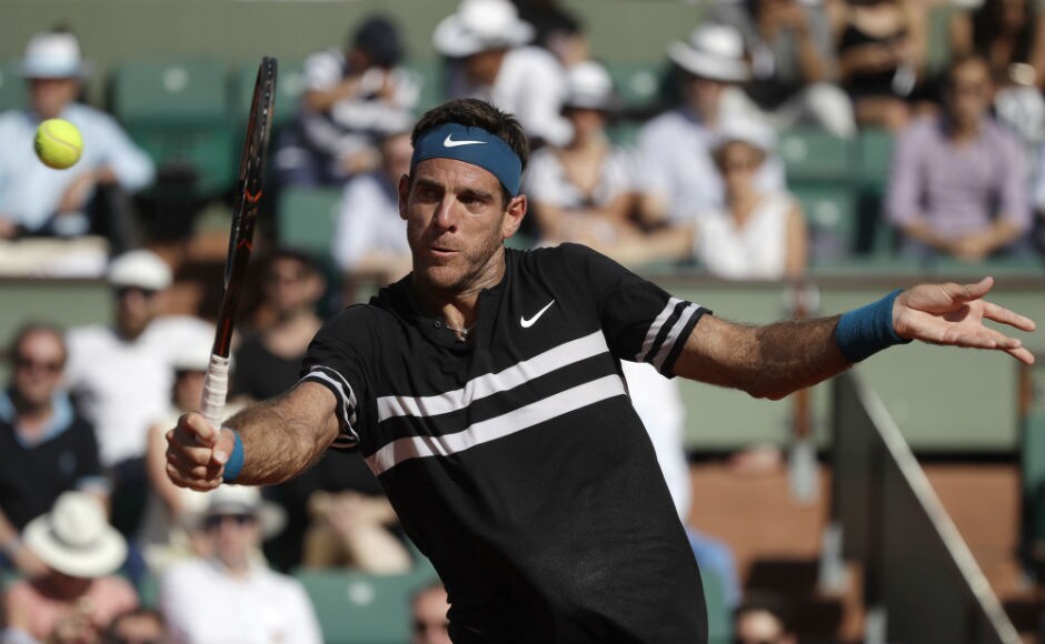 Argentina's Juan Martin Del Potro volleys the ball to Spain's Albert Ramos-Vinolas during their third round match. AP Argentina's Juan Martin Del Potro volleys the ball to Spain's Albert Ramos-Vinolas during their third round match. AP