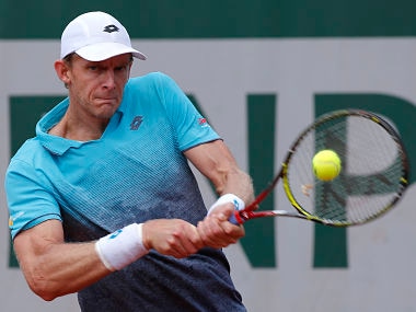 South Africa's Kevin Anderson returns the ball to Germany's Mischa Zverev during their third round match of the French Open tennis tournament at the Roland Garros stadium, Saturday, June 2, 2018 in Paris. (AP Photo/Michel Euler)