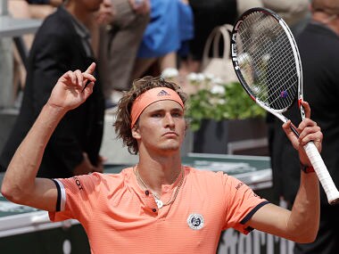 Germany's Alexander Zverev celebrates scoring a point against Russia's Karen Khachanov during their fourth round match of the French Open tennis tournament at the Roland Garros stadium in Paris, France, Sunday, June 3, 2018. (AP Photo/Alessandra Tarantino)