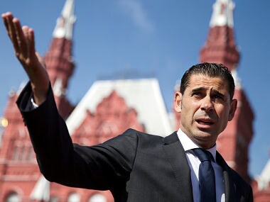 FILE - In this Friday, Sept. 18, 2015 file photo, former Spanish soccer star Fernando Hierro gestures as he speaks with the media at Red Square in Moscow, Russia. The Spanish soccer federation says former player Fernando Hierro will take over the national team during the World Cup. He is replacing Julen Lopetegui, who was fired Wednesday, June 13, 2018 after accepting a job to lead Real Madrid next season without informing the federation in advance. (AP Photo/Pavel Golovkin, file)