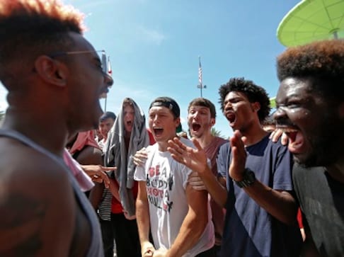 XXXTentacion mourned by thousands of fans at rapper's open-casket