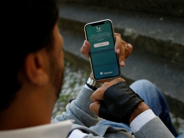 Ricardo Teixeira is demonstrates the phone app he developed to report accessibility infringements to authorities. Image: Reuters