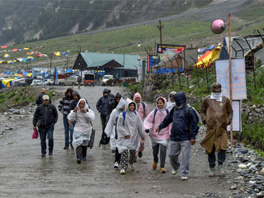Amarnath Yatra suspended due to landslides: Pilgrims stranded on Pahalgam, Baltal routes; toll rises to 11 Amarnath Yatra suspended due to landslides: Pilgrims stranded on Pahalgam, Baltal routes; toll rises to 11