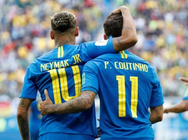 Philippe Coutinho celebrates scoring their first goal with Neymar. Reuters