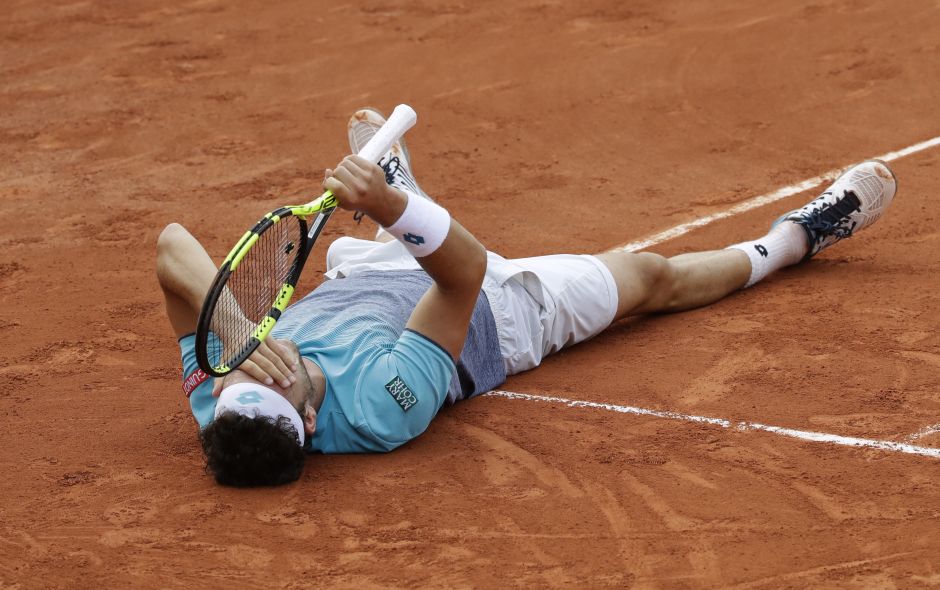 Italy's Marco Cecchinato celebrates winning his fourth round match against Belgium's David Goffin in four sets 7-5, 4-6, 6-0, 6-3. The Italian had never won a Grand Slam before Roland Garros and now he is into the quarter-finals after two back-to-back wins over top-10 seeds. AP Italy's Marco Cecchinato celebrates winning his fourth round match against Belgium's David Goffin in four sets 7-5, 4-6, 6-0, 6-3. The Italian had never won a Grand Slam before Roland Garros and now he is into the quarter-finals after two back-to-back wins over top-10 seeds. AP