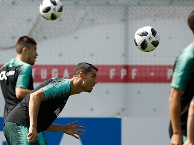 Portugal's Cristiano Ronaldo heads the ball during the training session of Portugal at the 2018 FIFA World Cup in Kratovo. AP