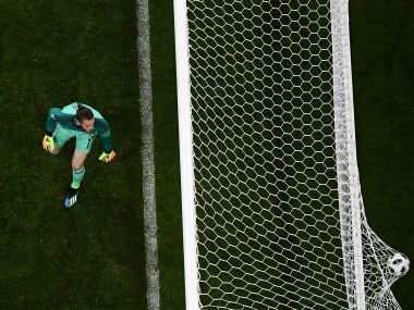 Spain's goalkeeper David De Gea concedes the third goal against Portugal. AFP
