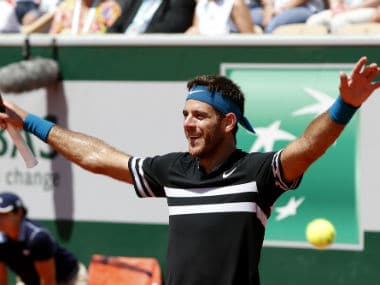 Argentina's Juan Martin del Potro raises his hands after defeating Croatia's Marin Cilic in their quarter-finals. AP