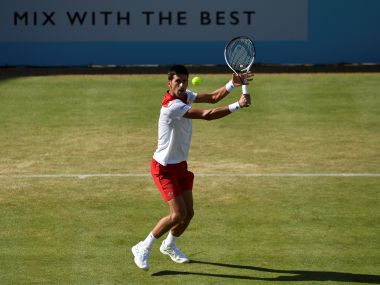 Novak Djokovic insists he is not a favourite for Wimbledon despite reaching quarters at Queen's Club Championships Novak Djokovic insists he is not a favourite for Wimbledon despite reaching quarters at Queen's Club Championships