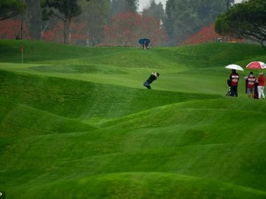 Asahi Power Service hopes its 'drone-brellas' will become par for the course for golfers. Image: AFP