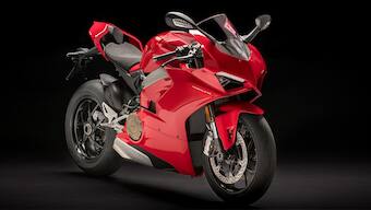 Four-cylinder Ducati Panigale V4 spotted in carbon fibre trim at UK dealership