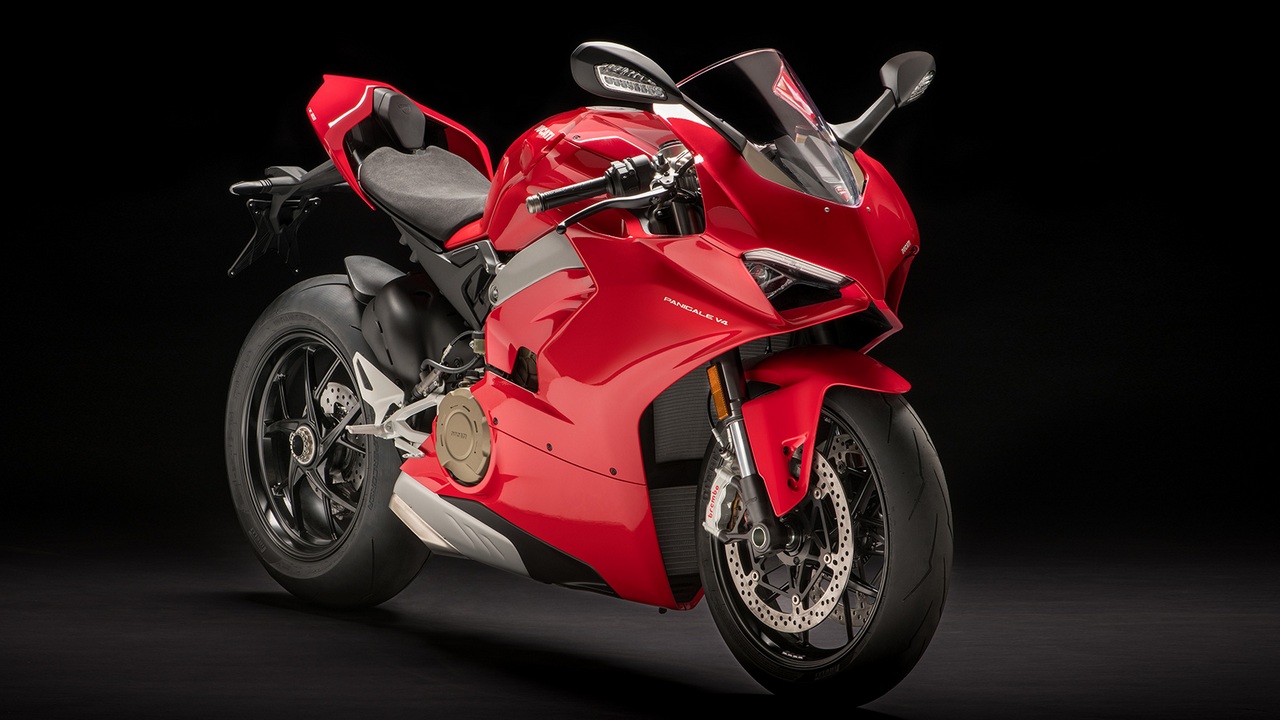 Four-cylinder Ducati Panigale V4 spotted in carbon fibre trim at UK dealership Four-cylinder Ducati Panigale V4 spotted in carbon fibre trim at UK dealership