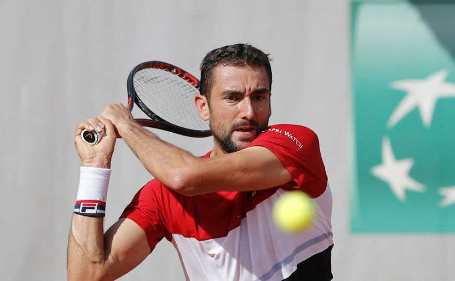 Croatia's Marin Cilic returns a shot against Steve Johnson of the US during their third round match of the French Open. AP Croatia's Marin Cilic returns a shot against Steve Johnson of the US during their third round match of the French Open. AP