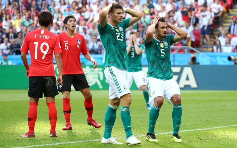 Germany's Mario Gomez and Mats Hummels react after a missed chance against South Korea at the 2018 World Cup. Reuters