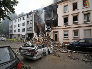 A car and a house are destroyed after an explosion in Wuppertal, Germany on Sunday. AP