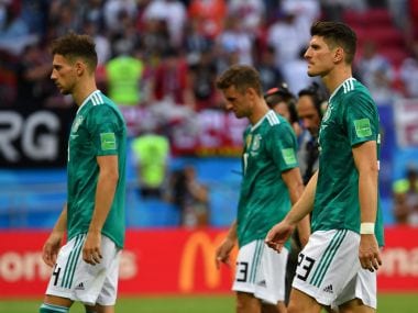 Germany's team players react after their loss to South Korea at the 2018 World Cup. AFP