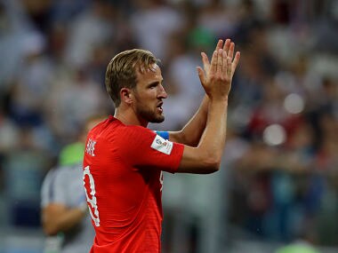 England's Harry Kane celebrates beating Tunisia 2-1 in a group G match. AP