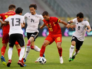 Belgium's Eden Hazard in action with Egypt's Tarek Hamed and Ramadan Sobhi. Reuters