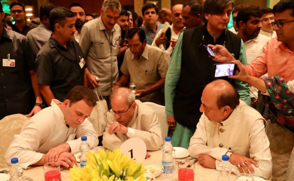 Days after a row erupted over his address at the RSS headquarters, former president Pranab Mukherjee broke bread with Rahul Gandhi at an iftar party hosted by the Congress president in New Delhi. Image courtesy: @RahulGandhi/Twitter Days after a row erupted over his address at the RSS headquarters, former president Pranab Mukherjee broke bread with Rahul Gandhi at an iftar party hosted by the Congress president in New Delhi. Image courtesy: @RahulGandhi/Twitter
