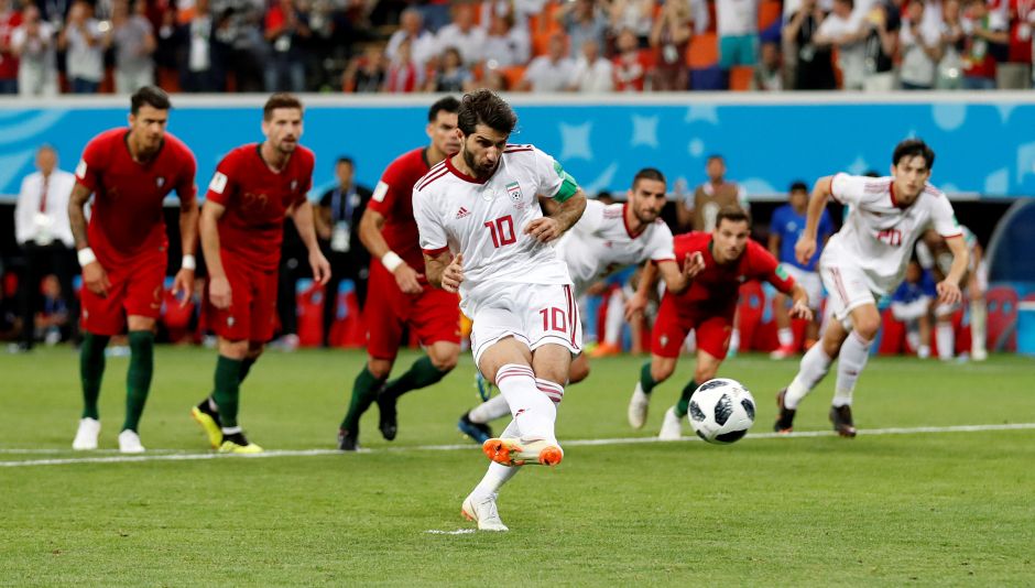 Iran's Karim Ansarifard scores their first goal from the penalty spot. Reuters Iran's Karim Ansarifard scores their first goal from the penalty spot. Reuters