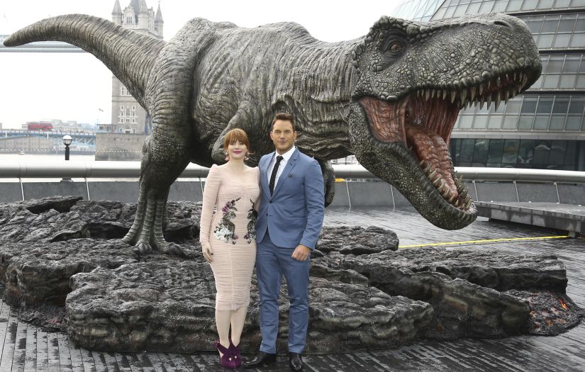Actors Chris Pratt, right, and Bryce Dallas Howard pose for photographers at the photo call for the film 'Jurassic World: Fallen Kingdom', in central London, Thursday, May 24, 2018. (Photo by Joel C Ryan/Invision/AP)