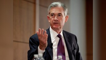 US Fed cuts interest rates for first time since 2008, signals it may not need to do more
