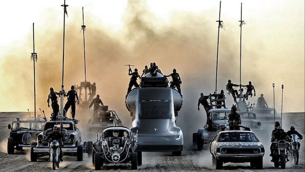 Elon Musk says development of a Mad Max inspired 'Cyborg Dragon Tesla' is almost done