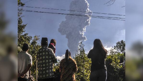 Indonesia's Merapi volcano ejects towering column of ash: Planes told to avoid area