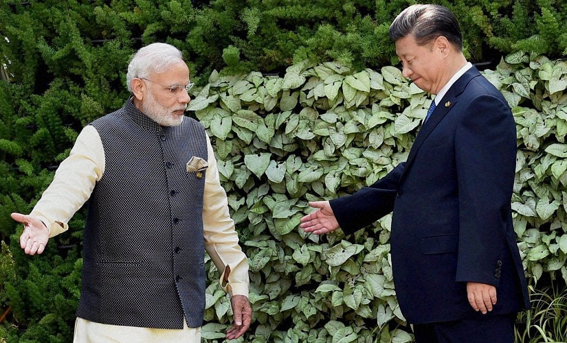 A file image of Prime Minister Narendra Modi with Chinese President Xi Jinping. PTI
