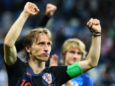 Croatia's midfielder Luka Modric celebrates their victory at the end. AFP