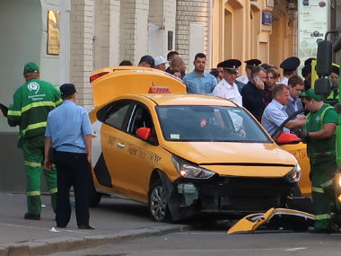 Moscow taxi driver falls asleep at wheel, injures seven football fans near Red Square after losing control of car Moscow taxi driver falls asleep at wheel, injures seven football fans near Red Square after losing control of car