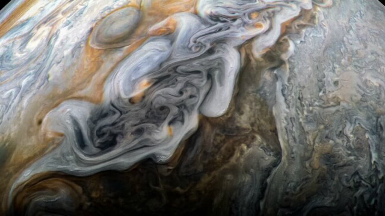In this latest image released by NASA, one can see Jupiter’s chaotic jets and vortices on the surface. Scientists think the large-scale dark regions are places where the clouds are deeper, based on infrared observations made at the same time by Juno’s JIRAM experiment. Twitter@NASAJuno In this latest image released by NASA, one can see Jupiter’s chaotic jets and vortices on the surface. Scientists think the large-scale dark regions are places where the clouds are deeper, based on infrared observations made at the same time by Juno’s JIRAM experiment. Twitter@NASAJuno