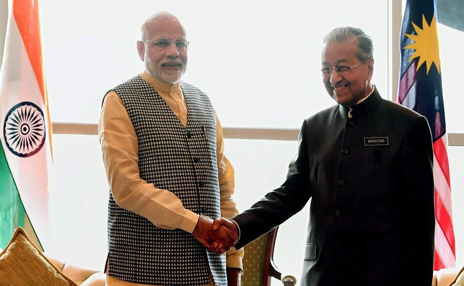 Modi on the second leg of his three-nation tour, met his Malaysian counterpart Mahathir Bin Mohamad on Thursay in his office at Perdana Putra Complex, Putrajaya. PTI Modi on the second leg of his three-nation tour, met his Malaysian counterpart Mahathir Bin Mohamad on Thursay in his office at Perdana Putra Complex, Putrajaya. PTI