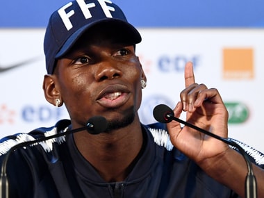 Manchester United midfielder Paul Pogba donates football boots worn in France's World Cup final victory to charity