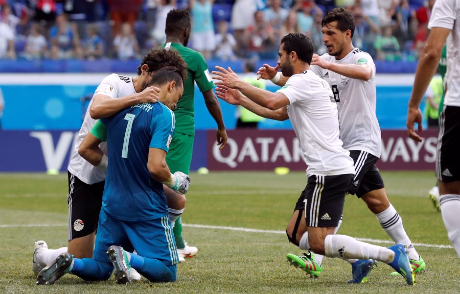 Egypt's Essam El-Hadary celebrates with teammates after saving a penalty kick. El Hadary saved a penalty after becoming the oldest player ever to appear at the World Cup but it was not enough to stop the Pharaohs sliding to a 2-1 defeat by Saudi Arabia. Reuters Egypt's Essam El-Hadary celebrates with teammates after saving a penalty kick. El Hadary saved a penalty after becoming the oldest player ever to appear at the World Cup but it was not enough to stop the Pharaohs sliding to a 2-1 defeat by Saudi Arabia. Reuters